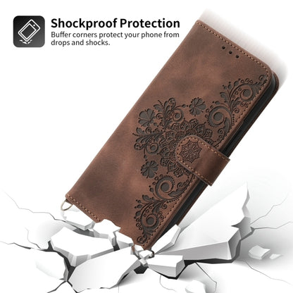 For Google Pixel 9 Skin-feel Flowers Embossed Wallet Leather Phone Case(Brown) - Google Cases by PMC Jewellery | Online Shopping South Africa | PMC Jewellery | Buy Now Pay Later Mobicred