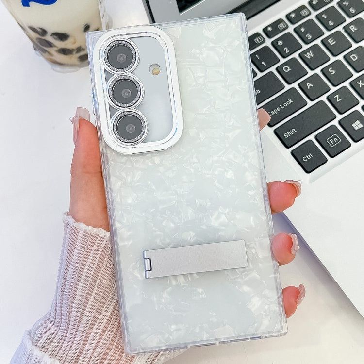 For Samsung Galaxy S25 5G Plating Glitter Texture Fold Holder TPU Phone Case with Lens Film(White Shell Pattern) - Galaxy S25 5G Cases by PMC Jewellery | Online Shopping South Africa | PMC Jewellery | Buy Now Pay Later Mobicred