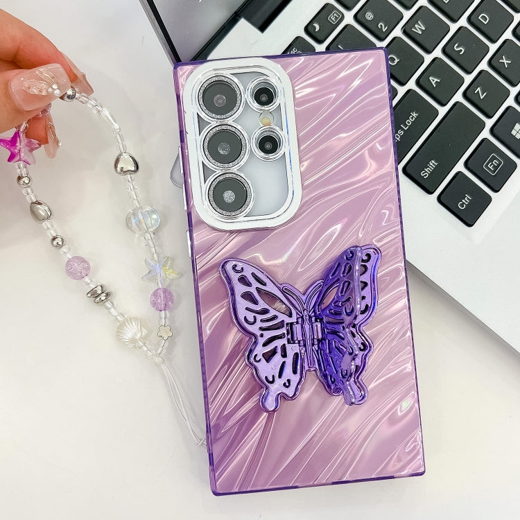 For Samsung Galaxy S25 5G Plating Glitter Lens Film Texture Butterfly Holder Wristband Phone Case(Purple Shell Pattern) - Galaxy S25 5G Cases by PMC Jewellery | Online Shopping South Africa | PMC Jewellery | Buy Now Pay Later Mobicred